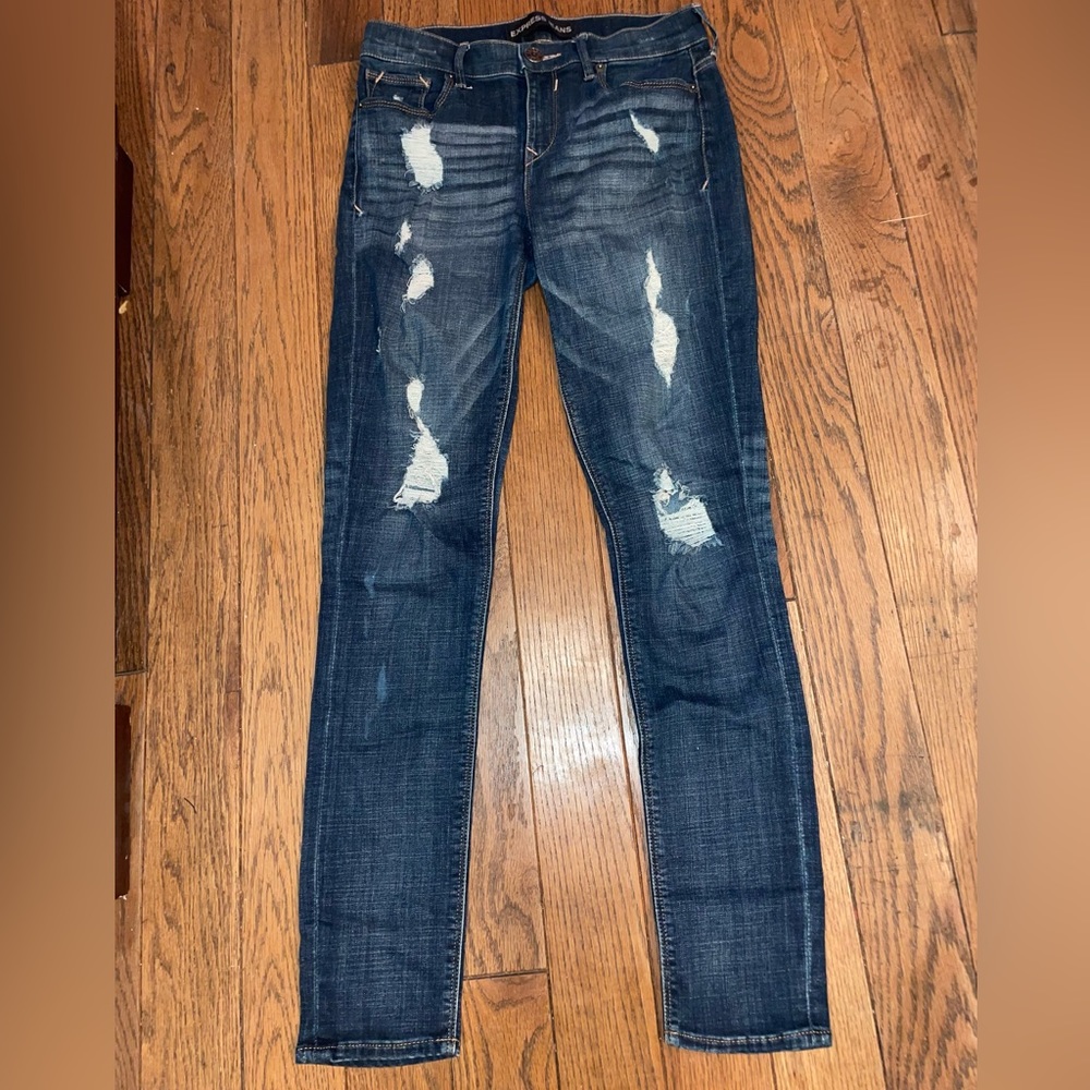 Express Jeans. Distressed. Stretchy. Mid rise. Size 2.